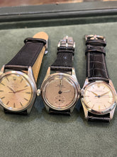 Load image into Gallery viewer, Rolex steel medly oysters on leather! From left 1. s/s gnts Rolex Airking Precision 34mm R49,999 2. Rolex Precision Royal 32mm R49,999 3.s/s gents Rolex oyster speed king 30mm Precision R49,999 .ALL R49,999 reduced to clear